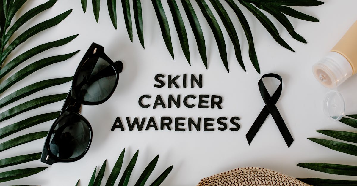 chercheur dermatologue analysant des données médicales sur écran pour détecter un mélanome grâce à l