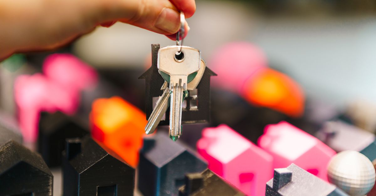 House keys resting on a property contract in France in 2026