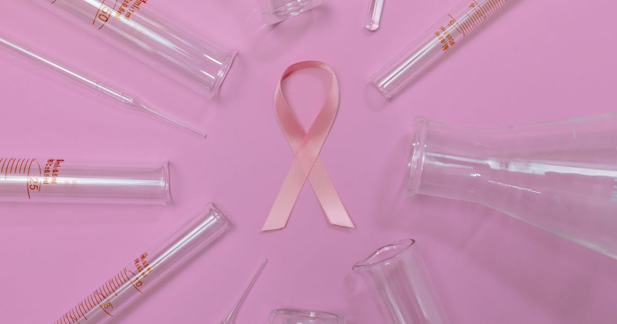 Researchers in a laboratory working on the development of an mRNA cancer vaccine
